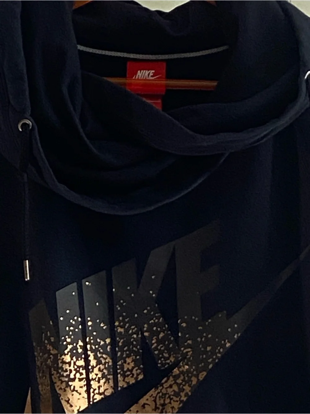 Nike Black Hoodie with Metallic Gold Swoosh Accent